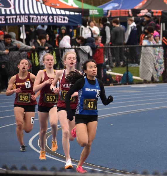 Junior Caitlyn Chang fights for third place in the mile at the Warrior Invitational on April 17th. 