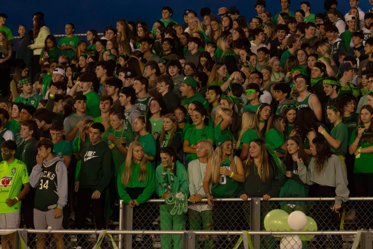 Student section at the Braintree High football game on September 27th wearing green in support of The Hidden Opponent. 