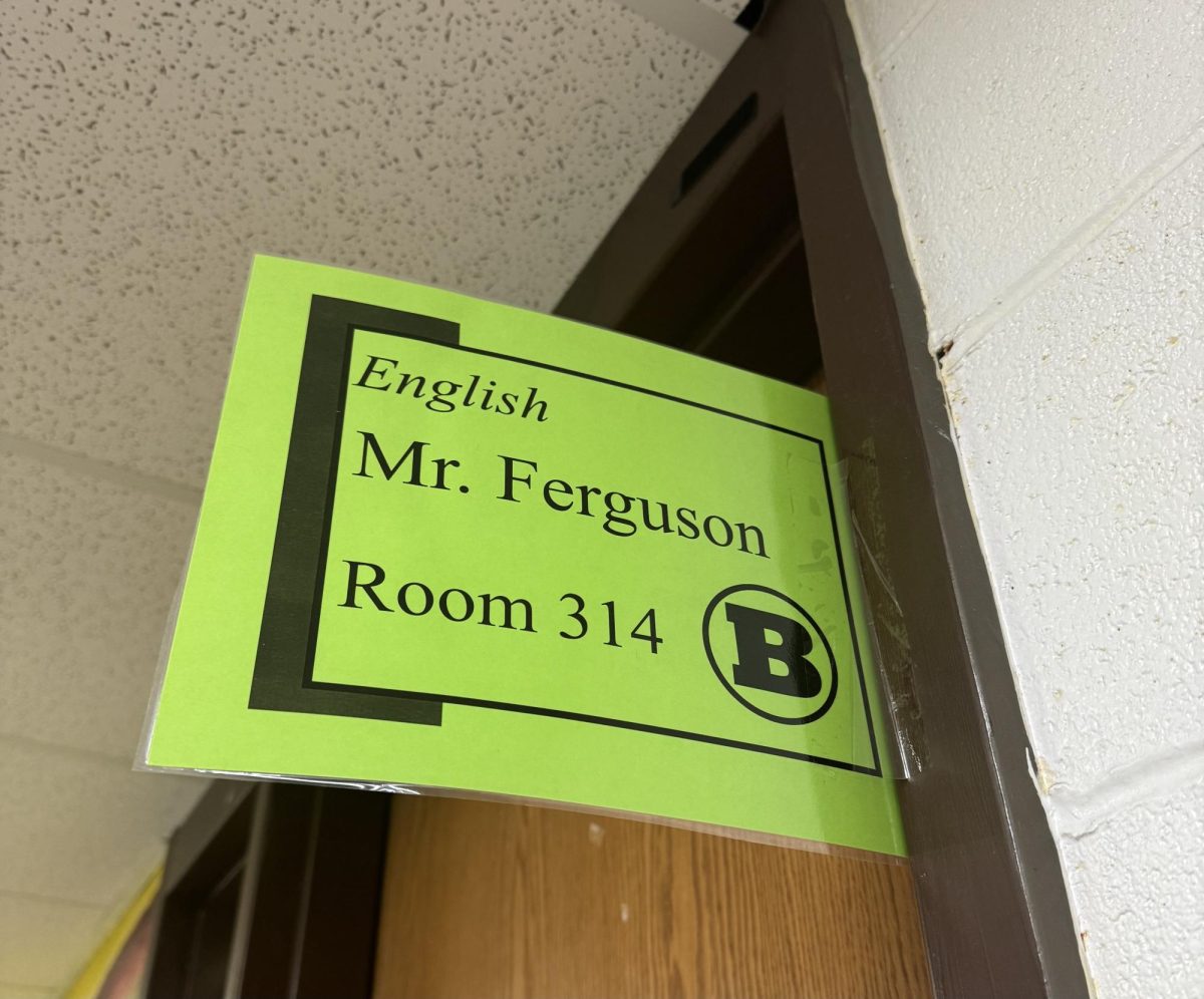 Photo of Mr.Ferguson's sign outside is own new classroom.