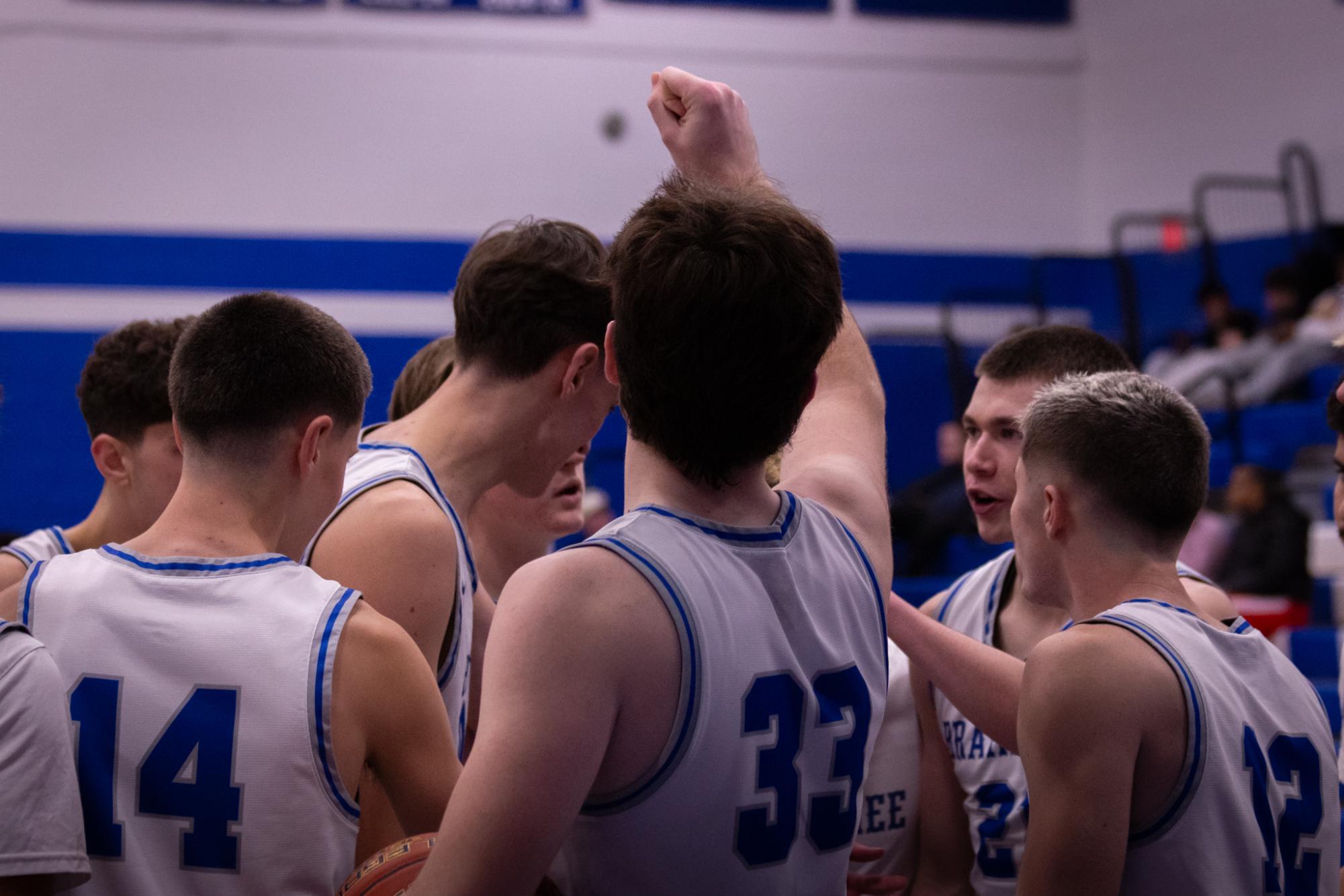 The team getting ready for the 2nd half at Herget Gymnasium on December 17, 2024.