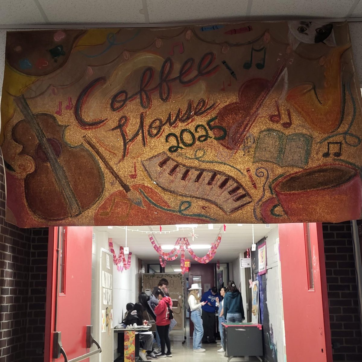 Hallway outside of the art wing featuring a Coffee House flag