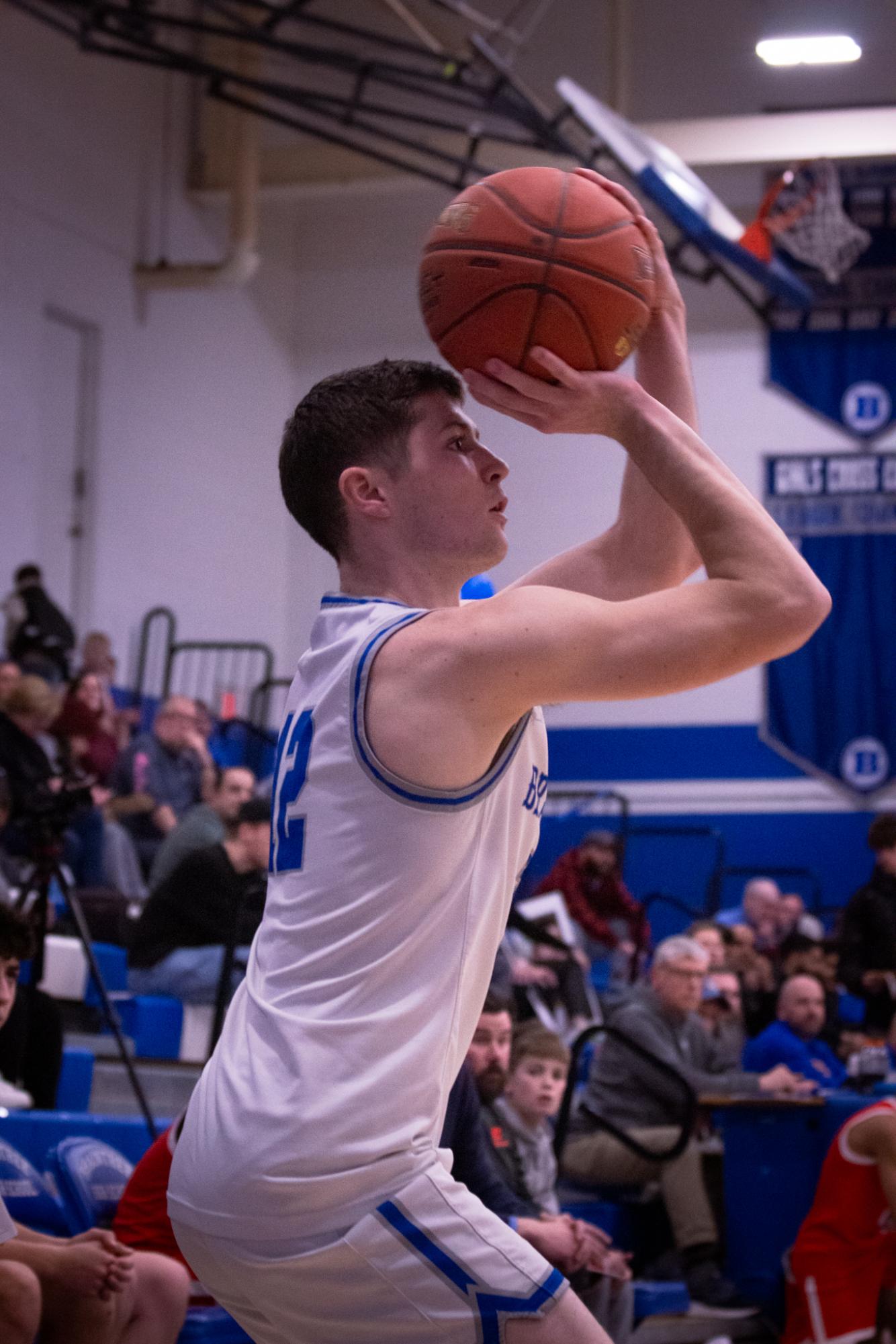 Senior Calum McClorey taking a 3-pointer at Herget Gymnasium on February 11th, 2025.