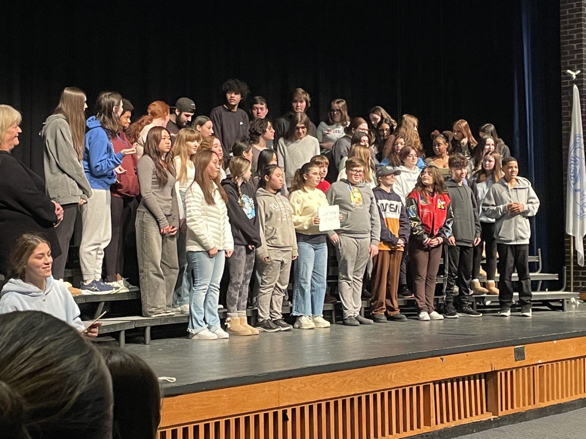 The Braintree High School Choir poses for their annual yearbook picture in the Auditorium. Two members of the choir were selected for All-State.