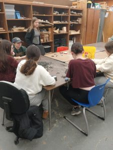 Tech Crew members gather in the wood shop to prepare for the upcoming production of "You're a Good Man, Charlie Brown".