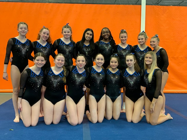 The 24-25 Girls Gymnastics Team poses for a group photo at Bay States 