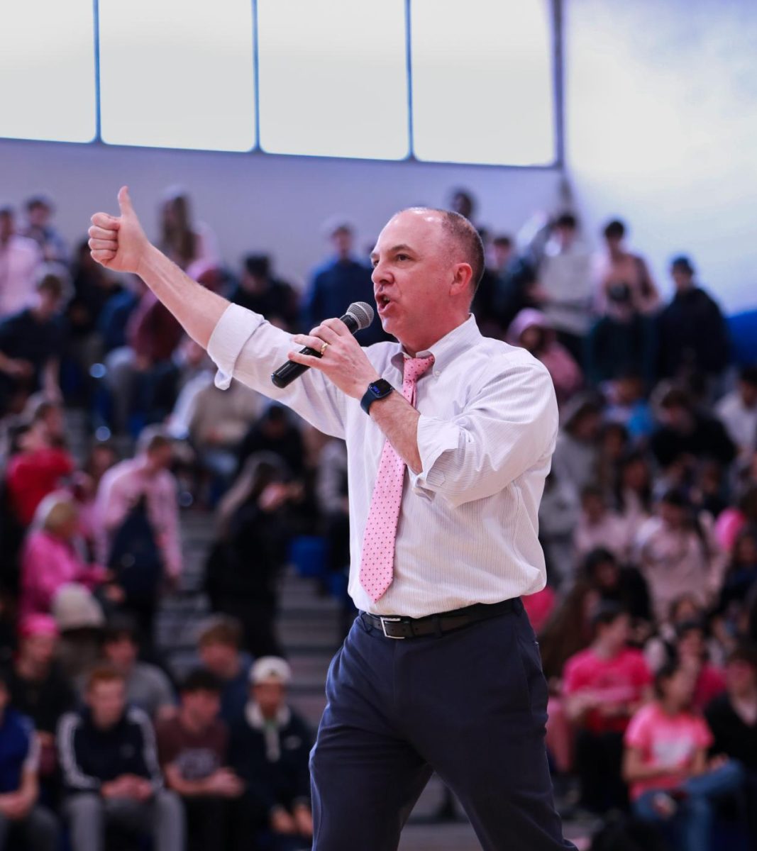 Dr. Scully addressing the crowd at the 2025 STAND UP rally at Herget Gymnasium on March 21st, 2025.