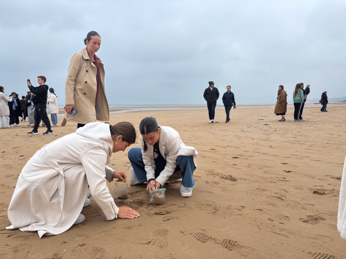 Braintree High students Molly and Sophia in Normandy at Omaha Beach, where D-Day took place.