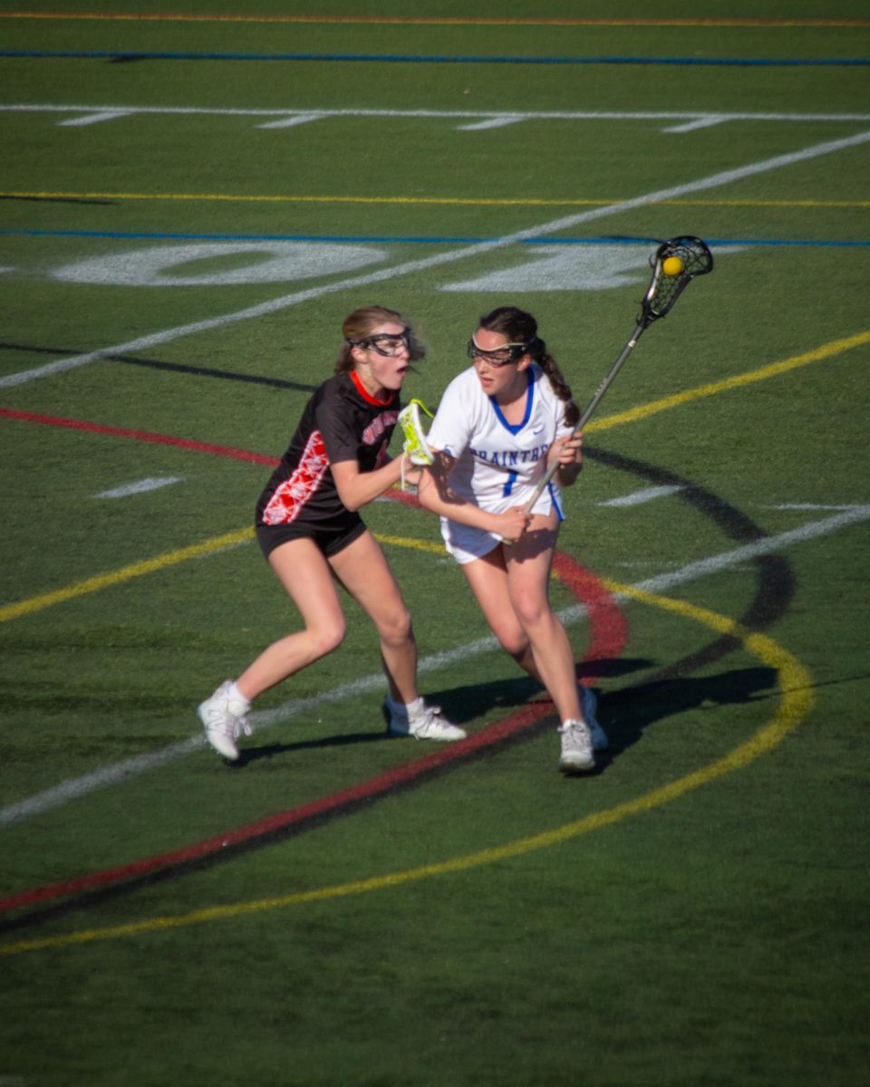 Captain Bella Duffy fighting her way up the field at Alumni Stadium on April 17, 2025.