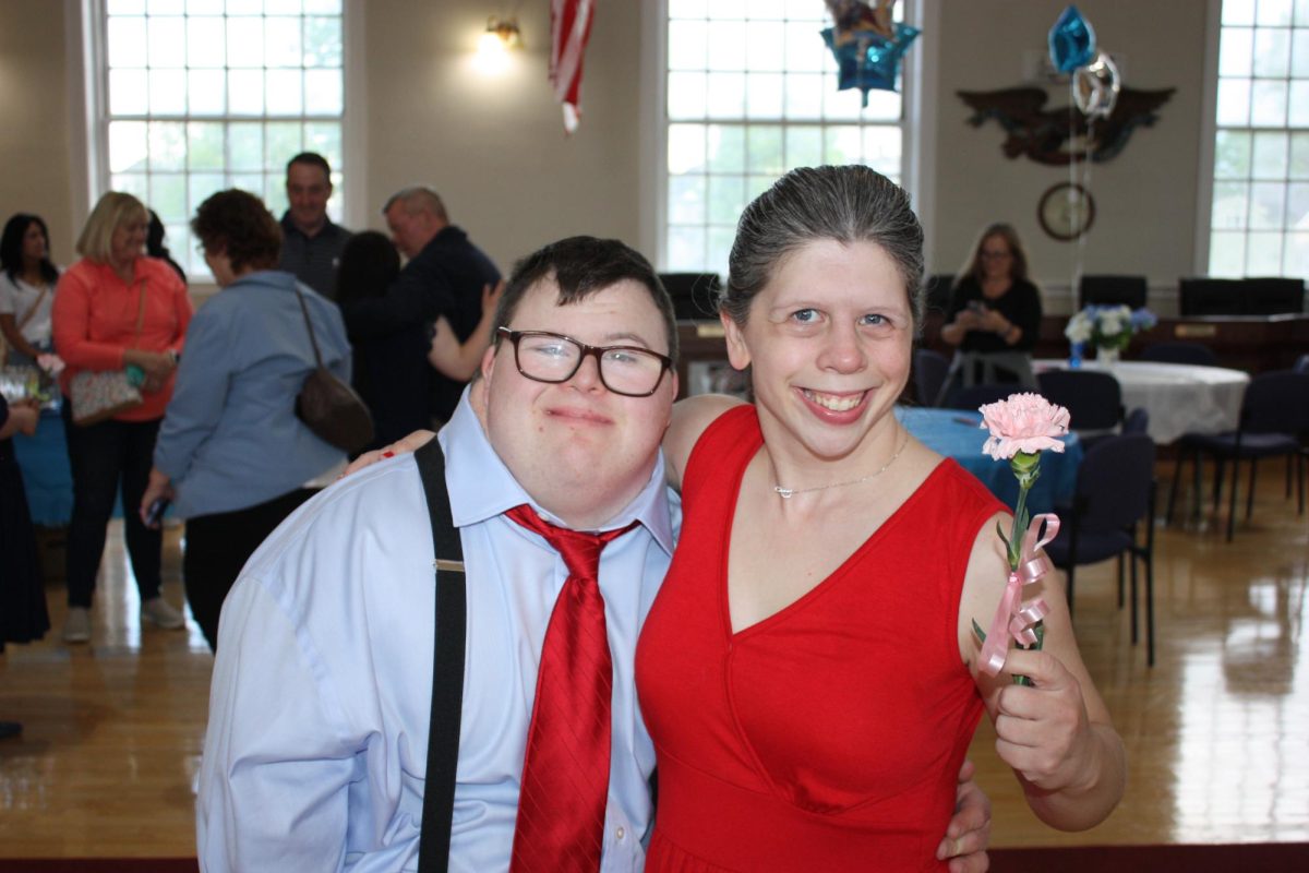 Teddy surprised Julie Ellis with a pink carnation at Braintree Town Hall on May 9th 2025.