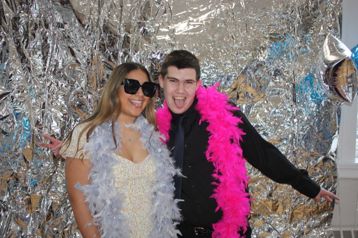 Wells and Mia Fernandez   strike a fierce pose with their boas at Braintree Town Hall on May 9th 2025.