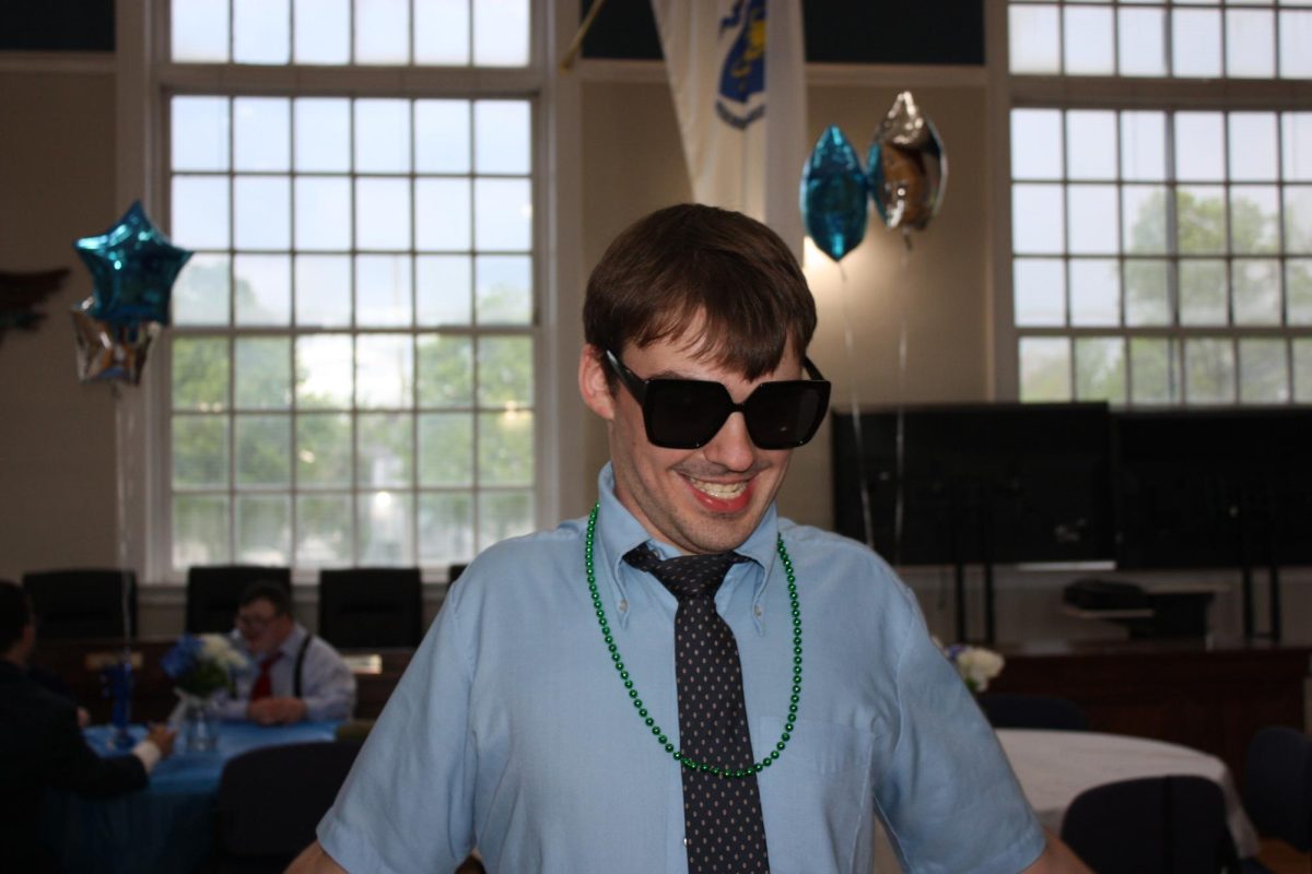  Best Buddies Member dancing like nobody is watching at Braintree Town Hall on May 9th 2025.