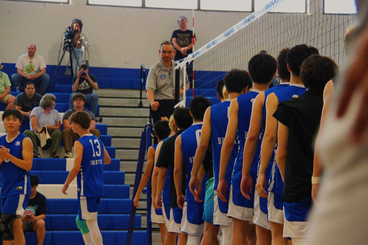 Braintree and Arlington shake hands before their MIAA round of 32 matchup. 
