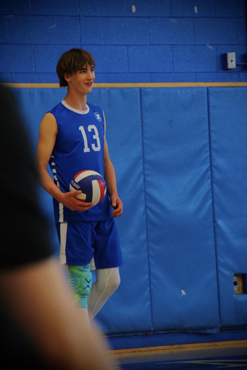 Junior Captain Jack Godderis, #13, getting ready to serve for Braintree.
