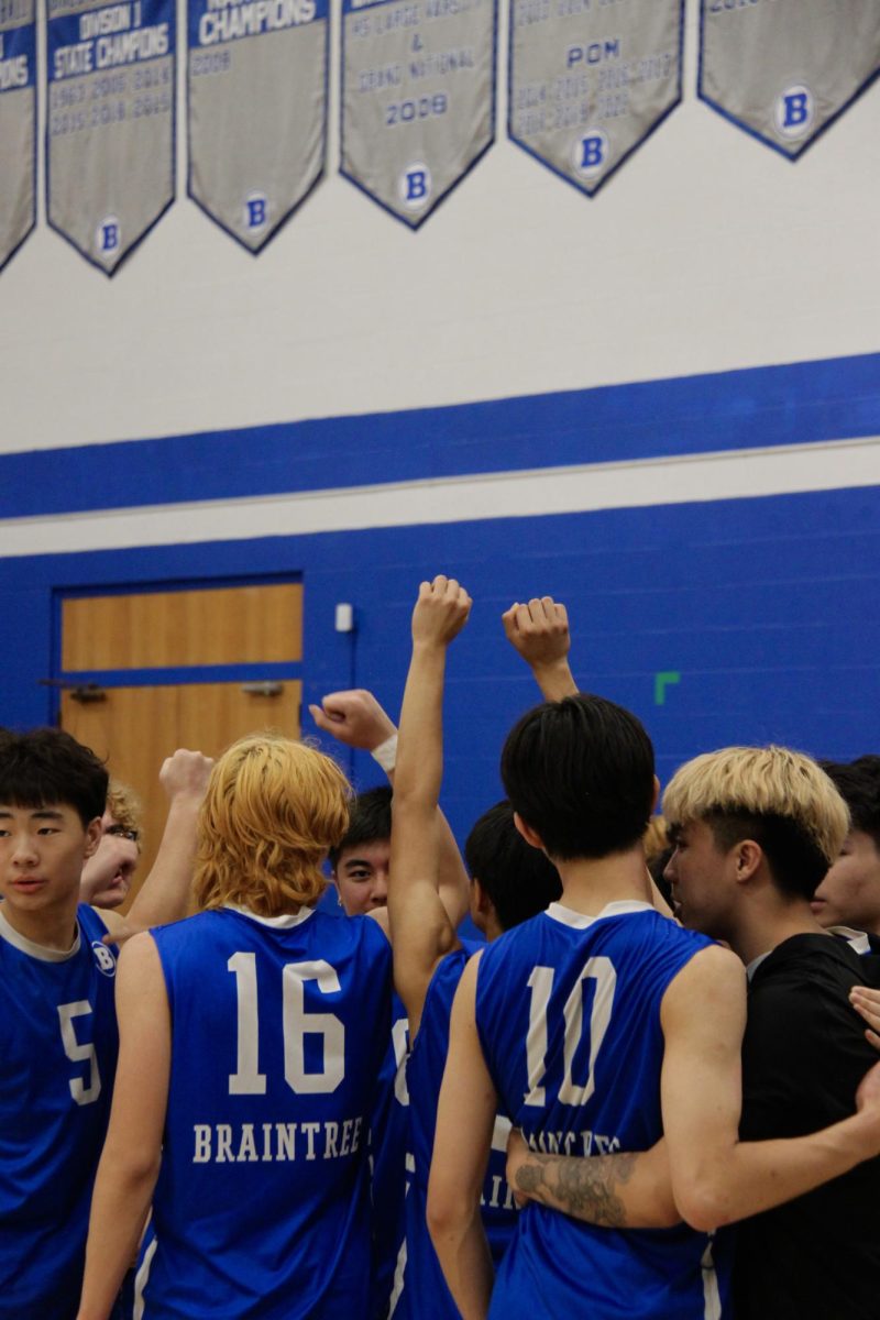 Braintree Boys get hyped during a timeout. 