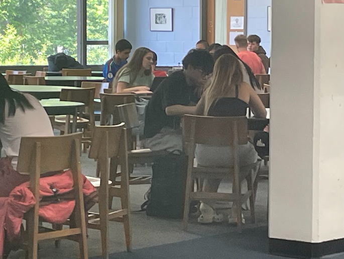 Photo of students in the seating area of Braintree High's media center during study hall. 