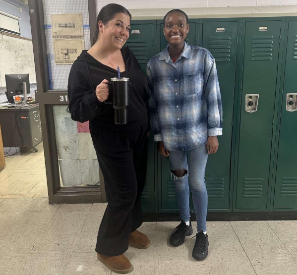 Mrs. Wallenstien and Trinity Berry swap outfits for spirit week.