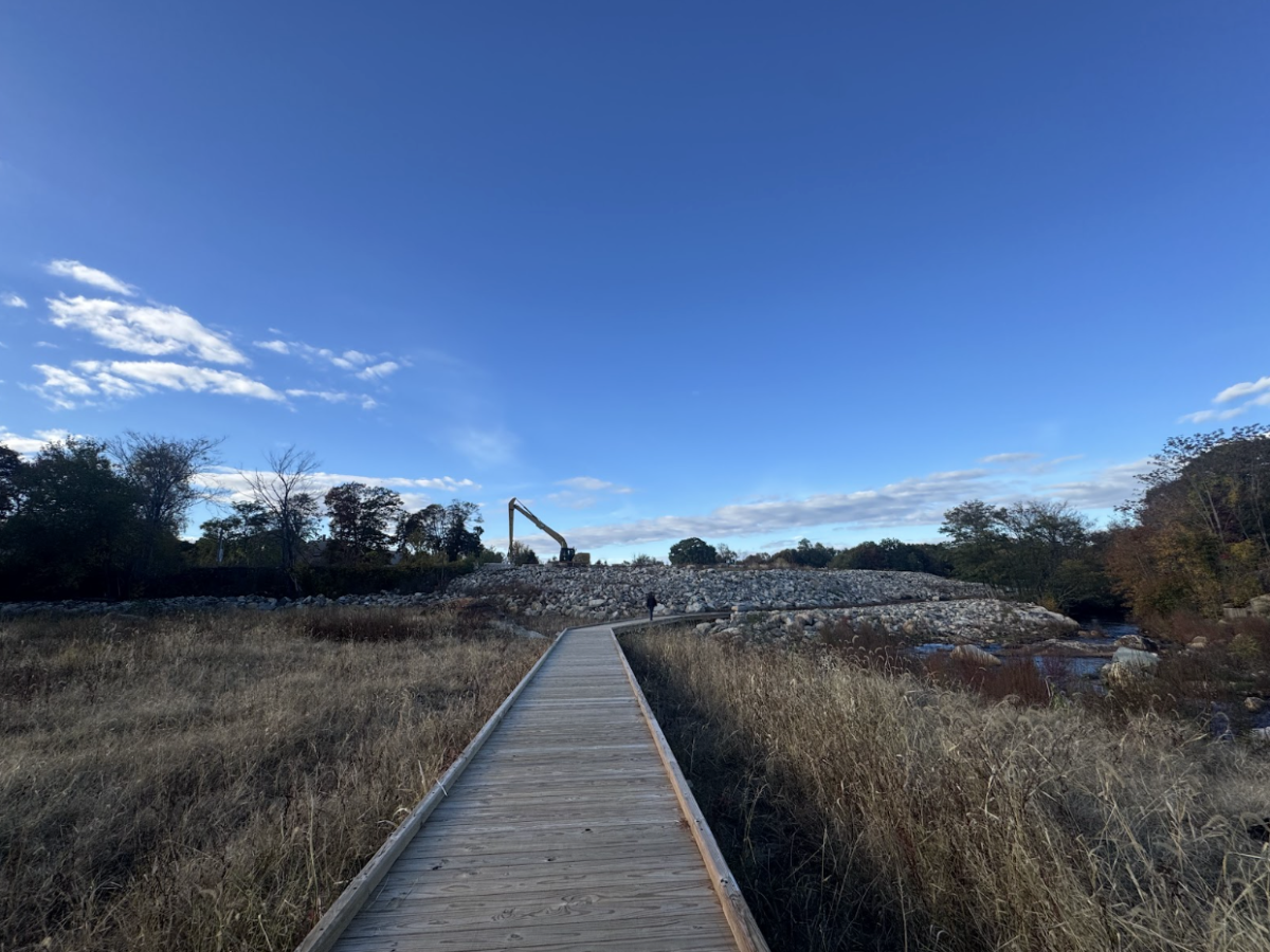 The boardwalk from a first-hand perspective before the leftover rock rubble from the project’s developments.