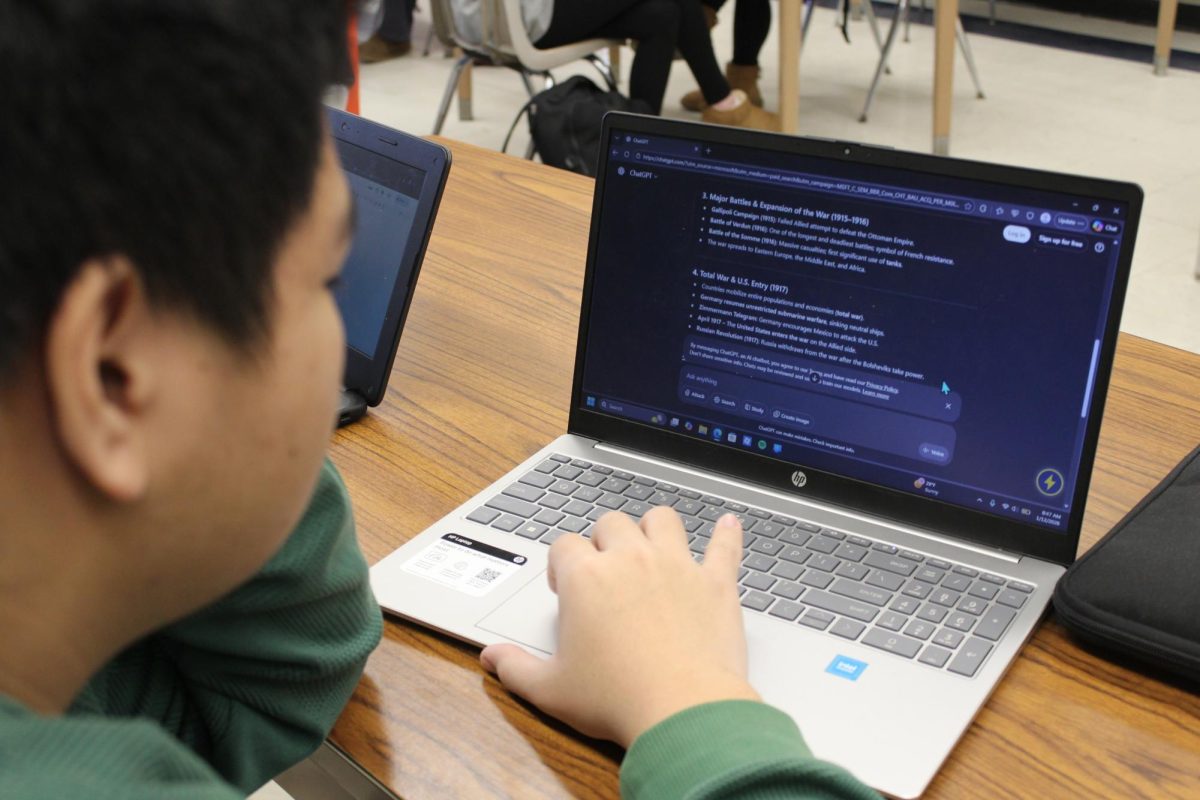 Student Lingxi Gan uses ChatGPT to aid in his research for a school project.