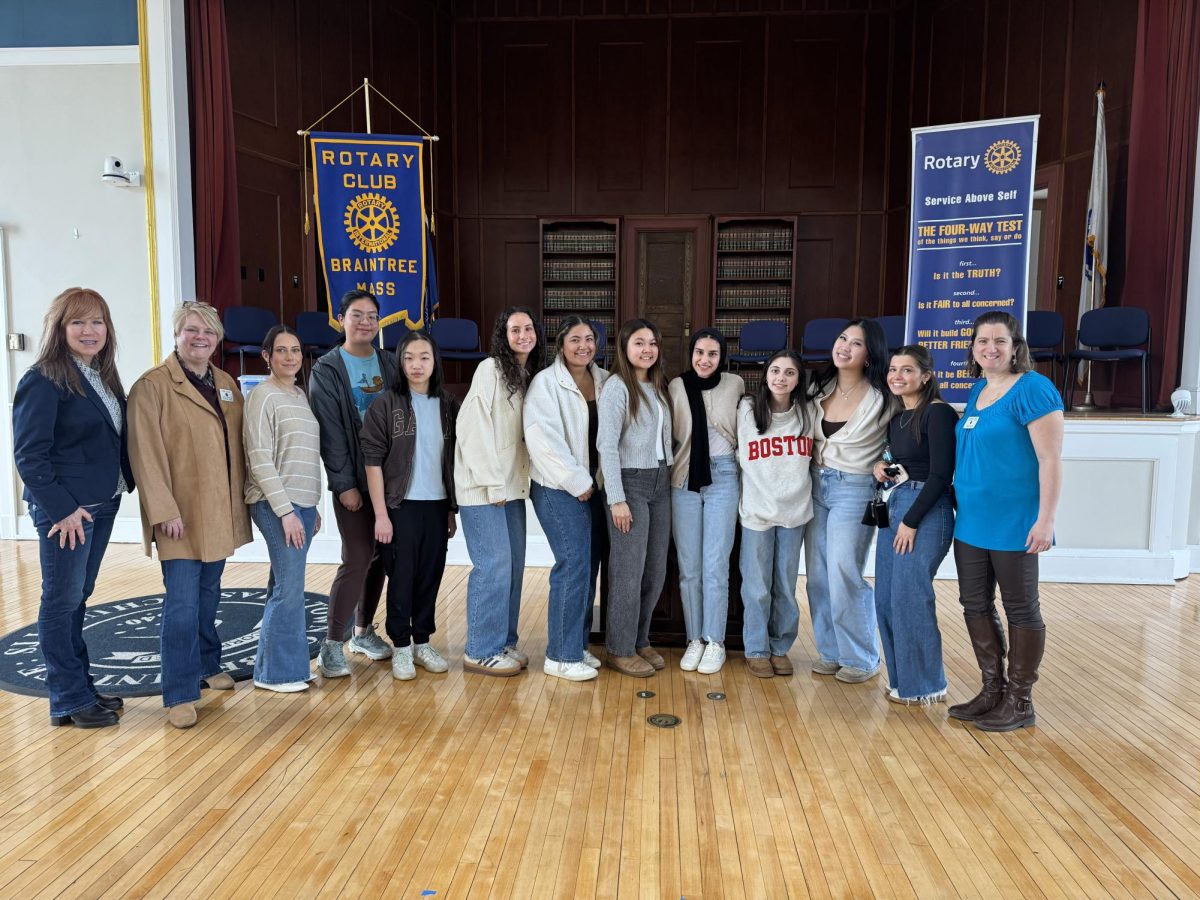 Interact students pose with Rotary Club members at honorary luncheon on March 26th hosted at Town Hall.