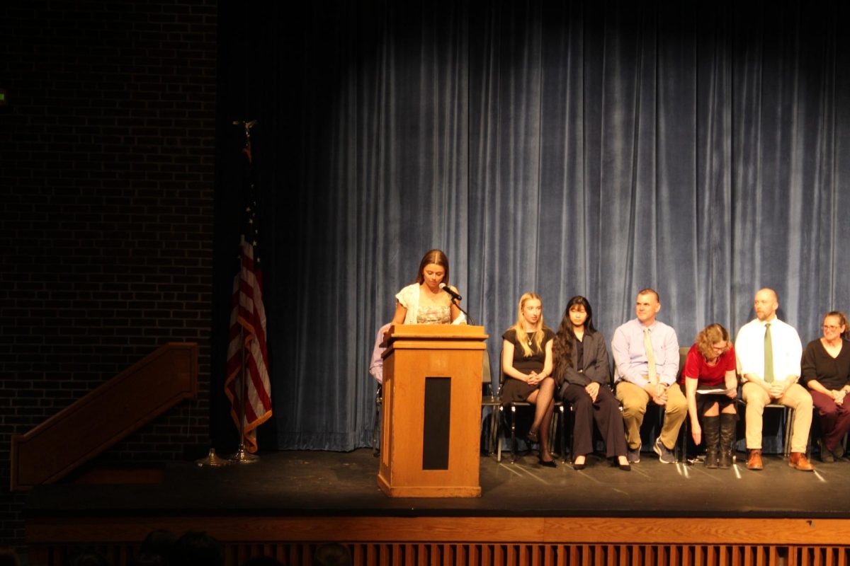 Vice President of Spanish National Honor Society, Frankie Mazzini, delivers speech at the language honor society induction on Wednesday April 29th in the auditorium.  